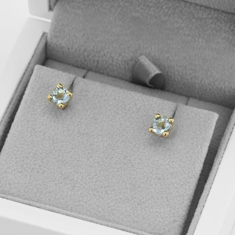 Goldene Ohrringe mit Aquamarin 51375