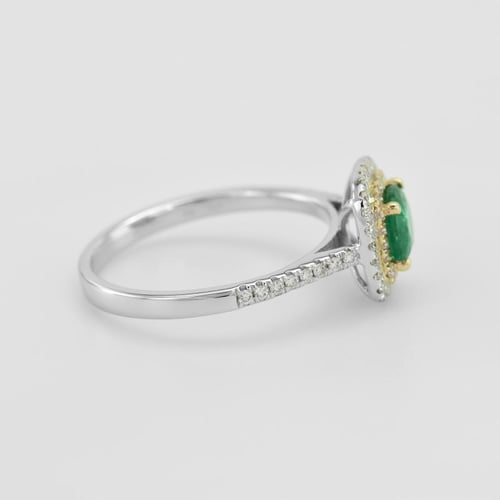 Ring aus zwei Goldarten mit Smaragd und Diamanten Vicente