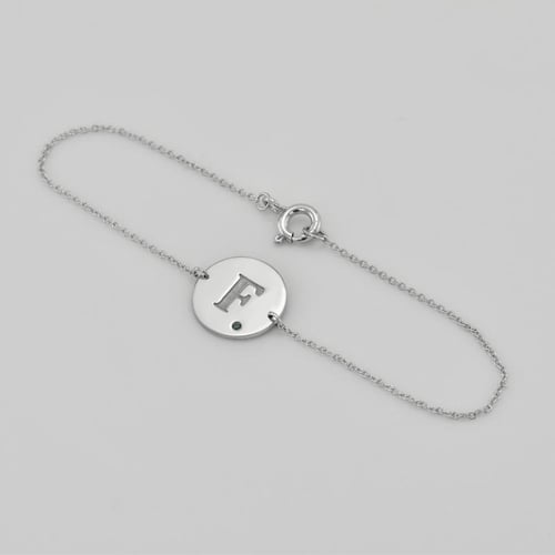 Goldenes Armband mit blauem Diamanten und Gravur Dian