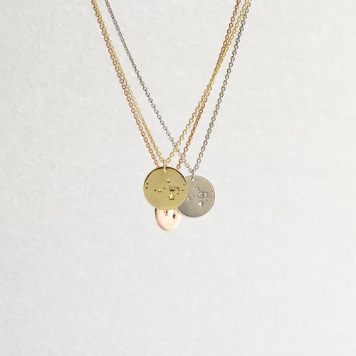 Silberner Anhänger mit Sternbild und Diamant Nyala