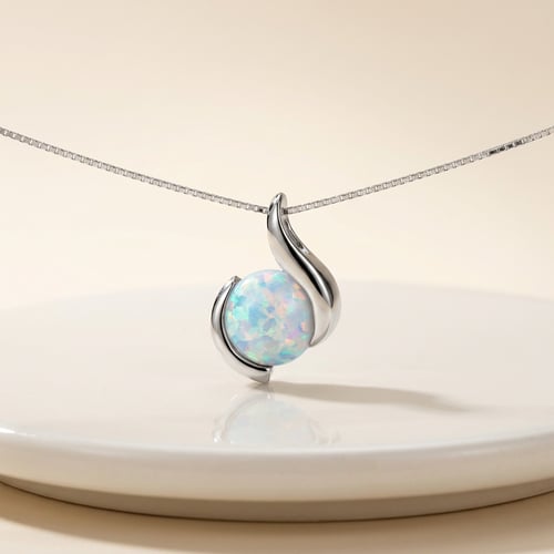 Silberne Anhänger mit weißem Opal Thirumal