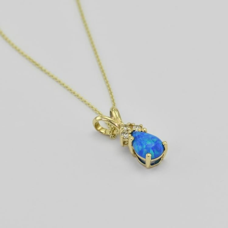 Goldener Anhänger mit bluem Opal und Diamanten Electrah 37875