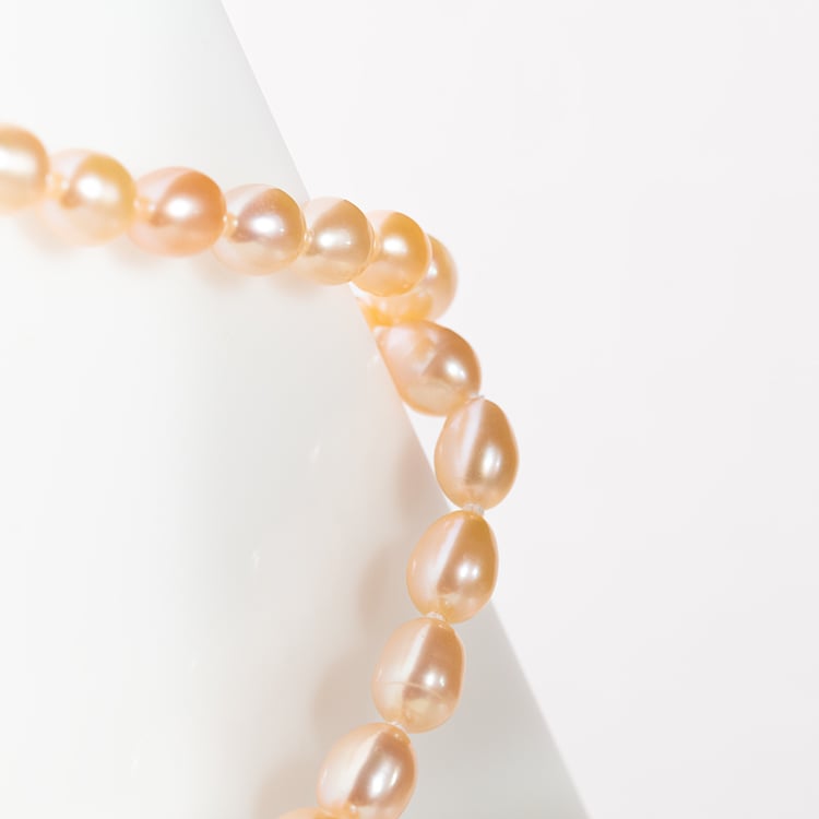 Kette mit pfirsichfarbenen Perlen Faust 147593
