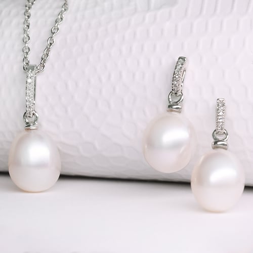 Goldenes Schmuckset mit Perlen und DIamanten Dudey