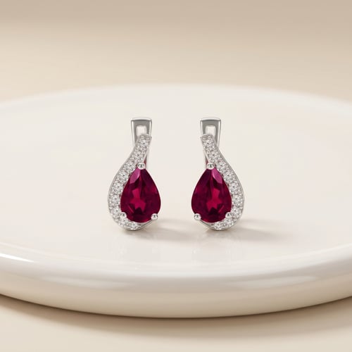 Silberne Ohrringe mit Rhodoliten und Zirkonia Rina