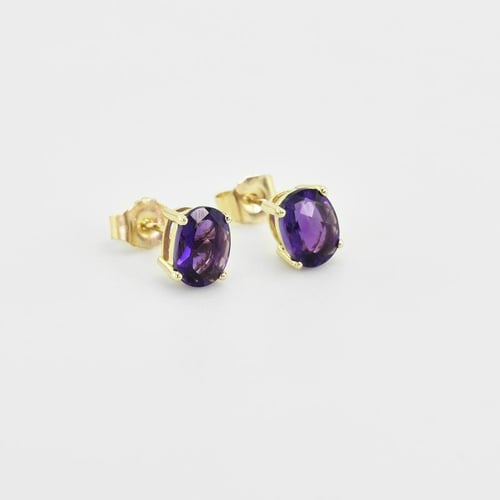 Goldene Ohrringe mit ovalen Amethysten Qati