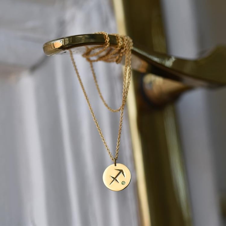 Silberner Anhänger mit Olivin und Sternzeichen Schütze 103491