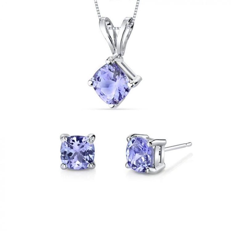 Goldene Kollektion von Schmuck mit Tansaniten Prentum