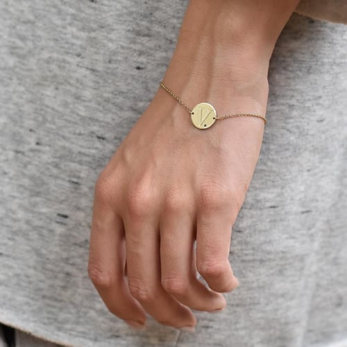 Armband aus Gold mit schwarzen Diamanten und Gravur Dian