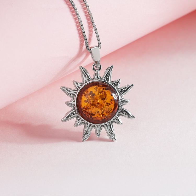 Silberner Anhänger in Form einer Sonne 150714