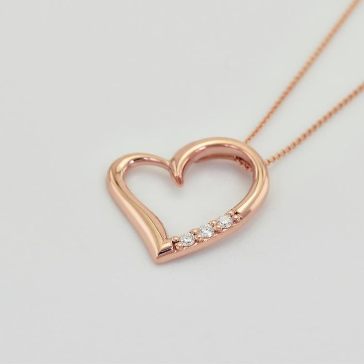 Silberner Anhänger mit einem Herzen und Diamanten Tanish 103498