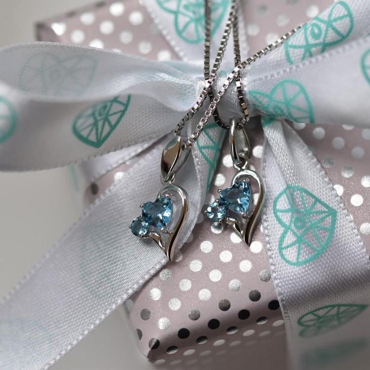 Silbernes Schmuckset mit Topasen Arivali 26072