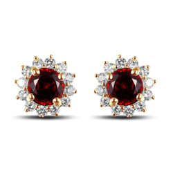Goldene Ohrringe mit Diamanten und Granaten Walvia