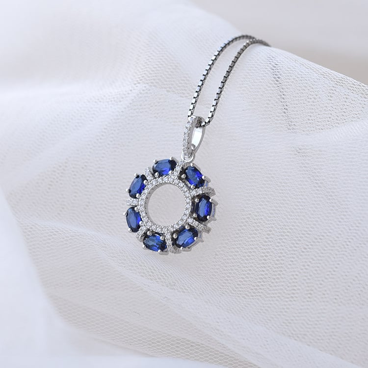 Silberner Anhänger mit Saphiren und Zirkonia Janis 69217