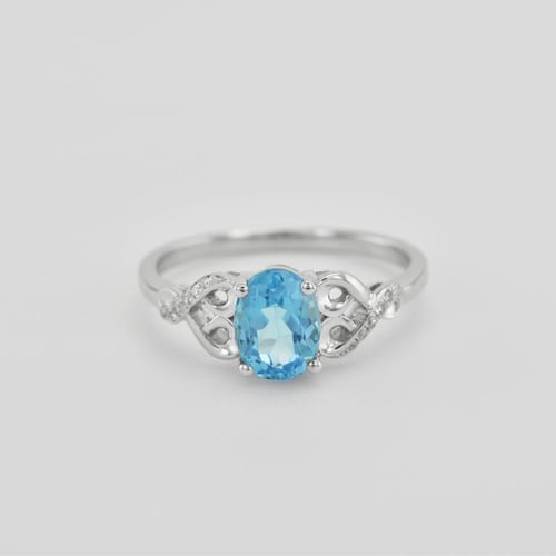 Goldring mit Blautopas und Diamanten Alanyse