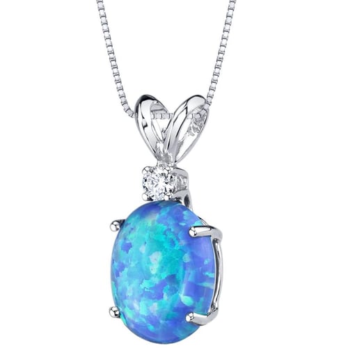 Goldener Anhänger mit blauem Opal und Diamant Rafiah
