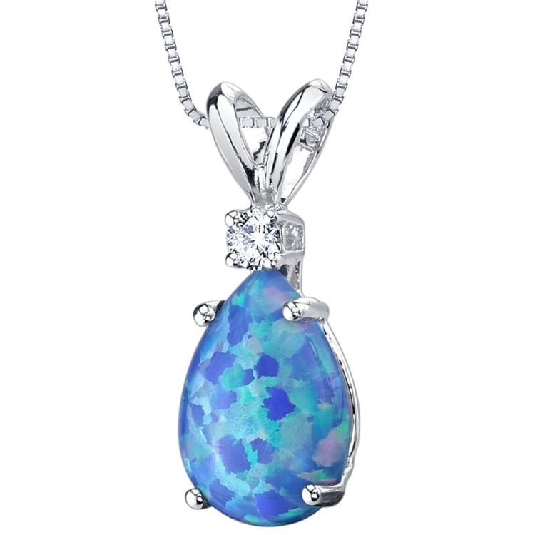 Goldener Anhänger mit blauem Opal und Diamant Zabou