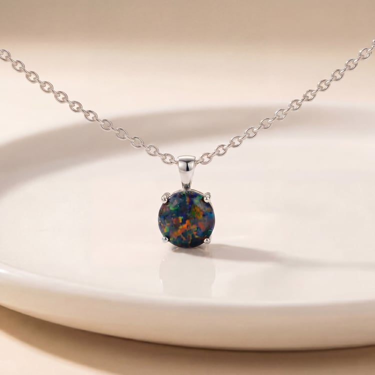 Schwarzer Opal im goldenen Anhänger Jorika 170524
