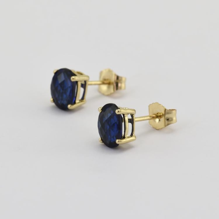 Goldene Ohrringe mit ovalen Saphiren Qati 9725