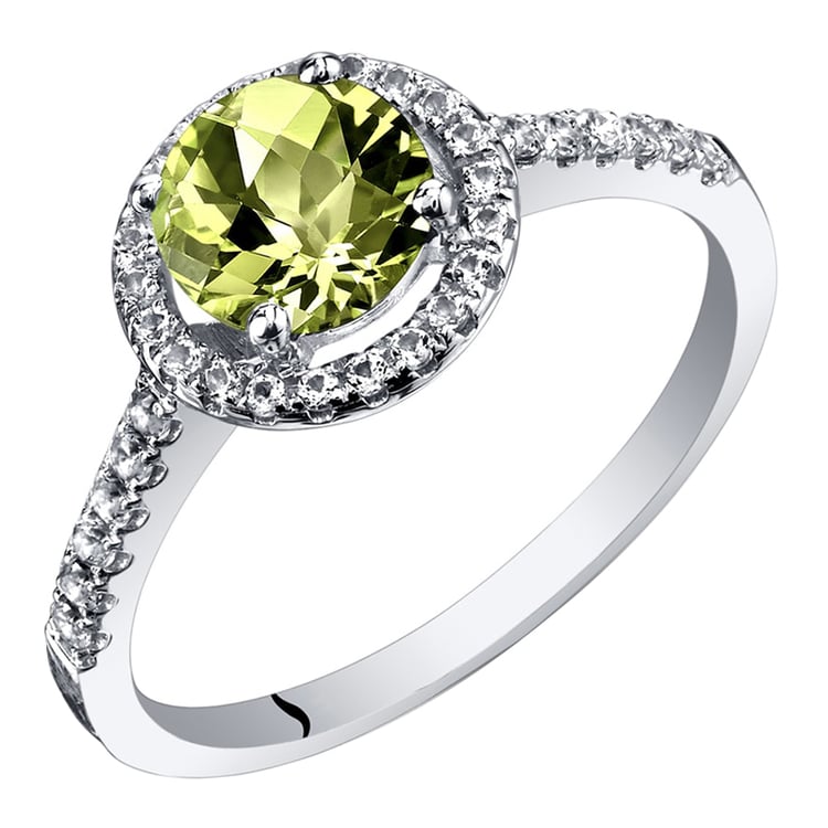 Olivin im goldenen Ring mit Topas Abbas