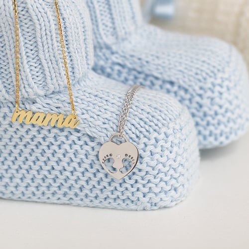 Goldener Anhänger mit Kinderfüßen und Gravur Olivia