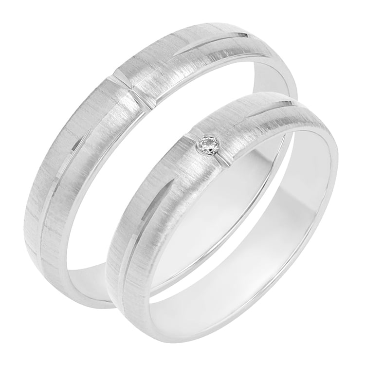 Dezente Eheringe mit einem Diamanten Sarika 78637