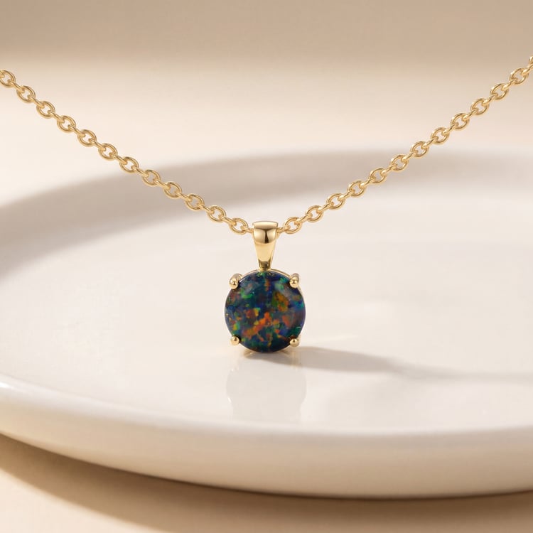 Schwarzer Opal im goldenen Anhänger Jorika 170097