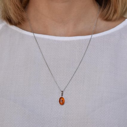 Goldener Anhänger mit Bernstein Janter