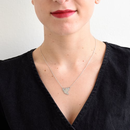 Anhänger in Form einer Friedenstaube mit Diamanten Dove