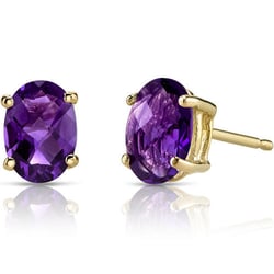 Goldene Ohrringe mit ovalen Amethysten Qati