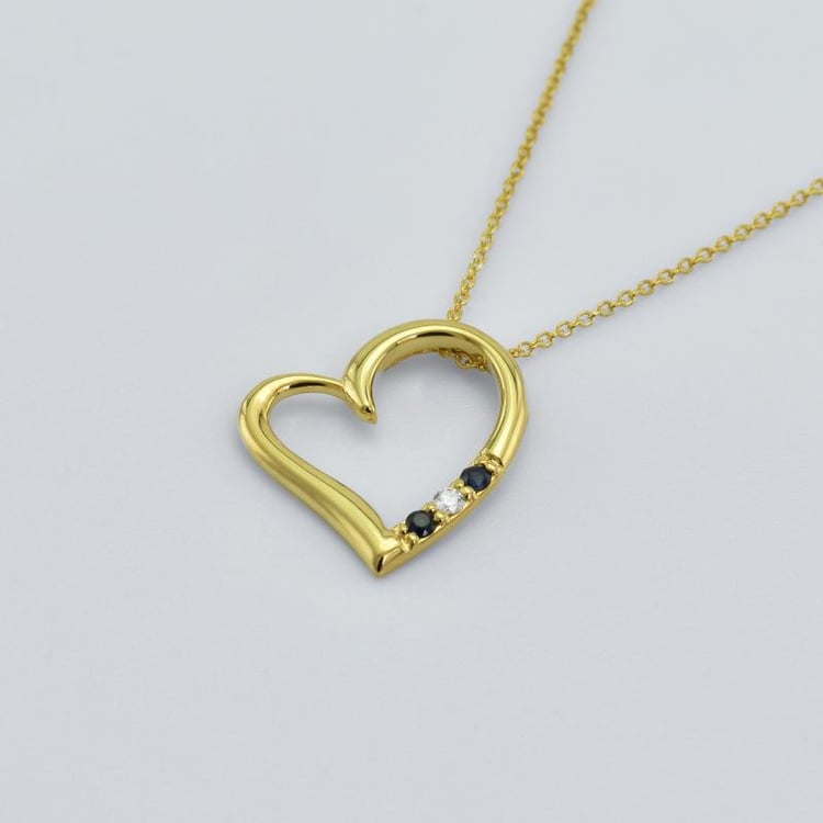 Goldener Anhänger Herzform mit Saphiren und Diamanten Tanish 37474