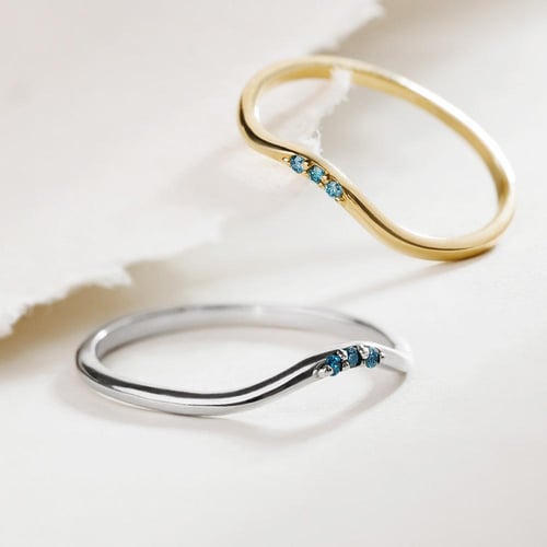Silberner Ring mit drei blauen Diamanten Cason