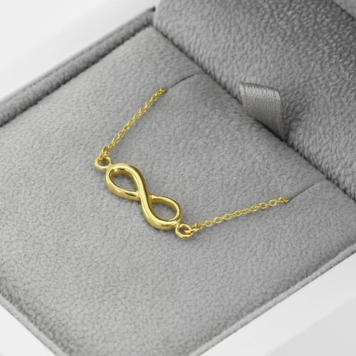 Schmuckset aus Gold mit Unendlichkeitszeichen Infinity