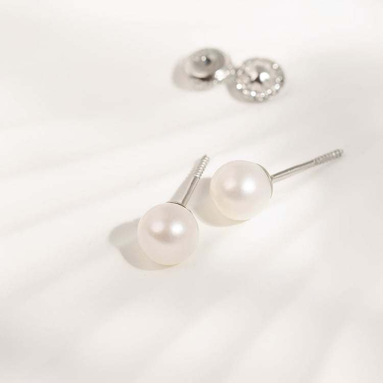 Goldene Ohrstecker mit Perlen 158438