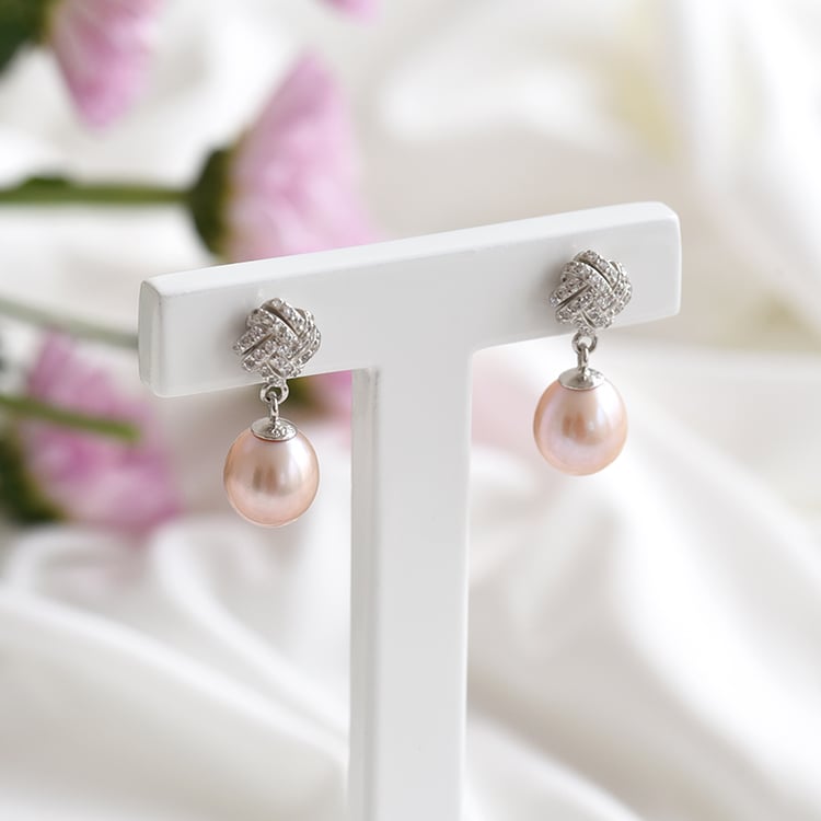 Silberne Ohrringe mit lavendelfarbenen Perlen und Zirkonia Ivona 83567