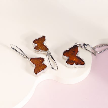 Silbernes Schmuckset mit Bernstein in Form eines Schmetterlings Peteli