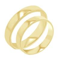 Goldene Eheringe mit einem verzierten Rand Rayan