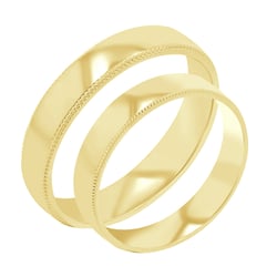 Goldene Eheringe mit einem verzierten Rand Rayan
