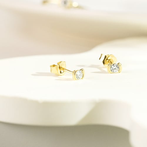 Minimalistische goldene Ohrstecker mit Diamanten Vilhelmina