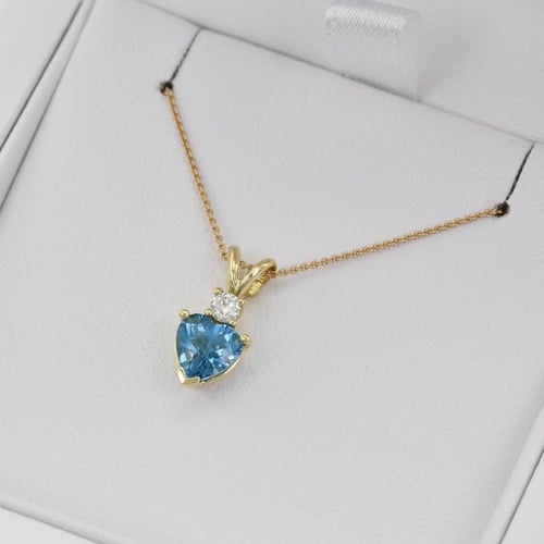 Goldanhänger mit Topas und Diamanten Dorevie