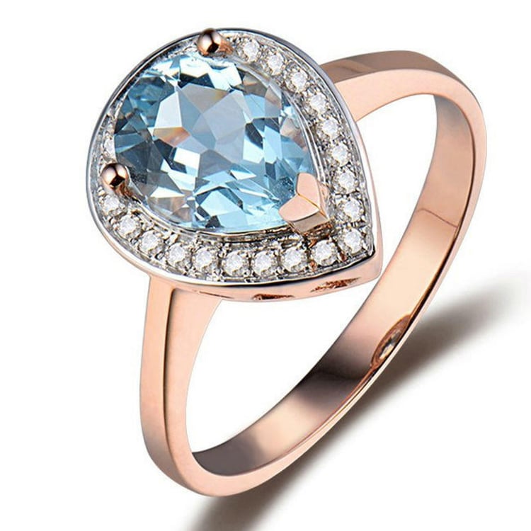 Goldring mit Topas und Diamanten