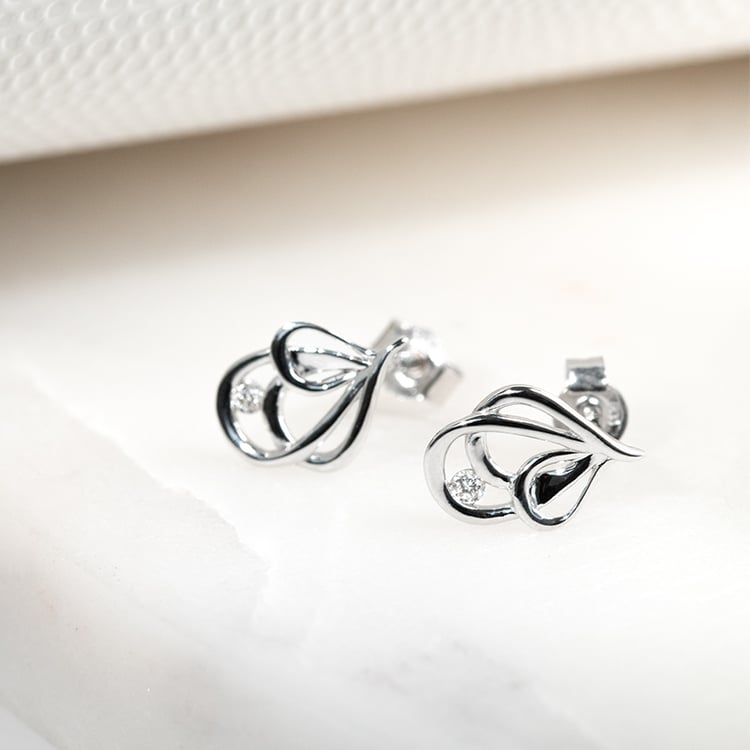 Dezente goldene Ohrringe mit glänzenden Diamanten Melle 131885