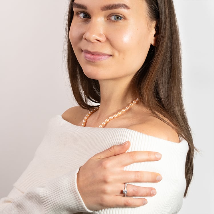 Kette mit pfirsichfarbenen Perlen Faust 149974