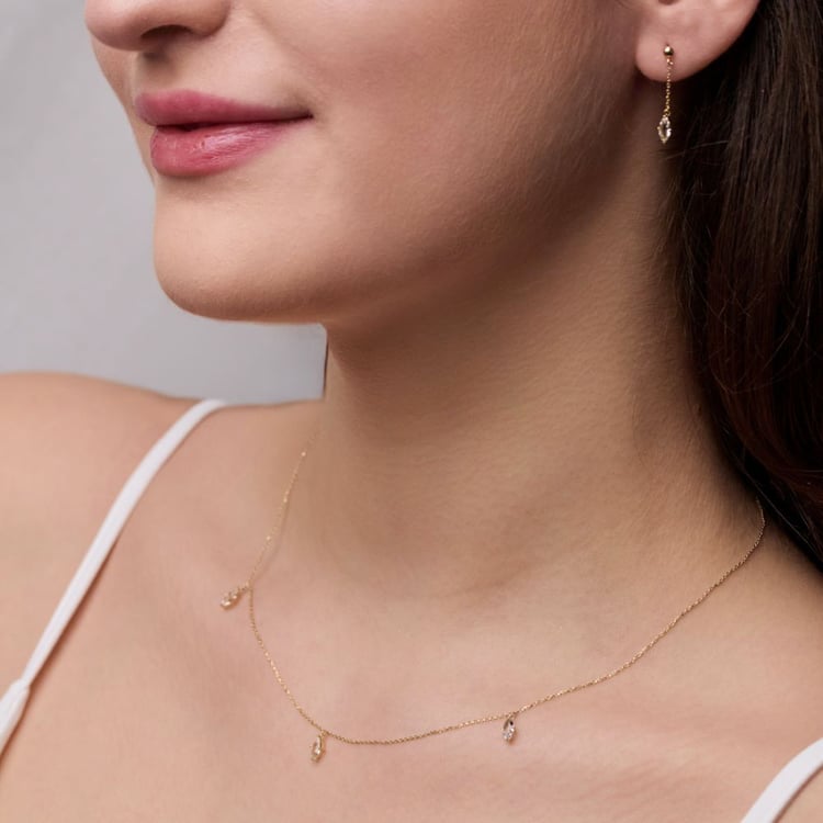 Goldene Hängeohrringe mit weißem Topas Maritza 164051