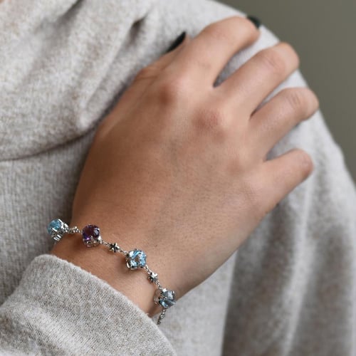 Goldenes Armband mit Topasen und Amethyst Heady
