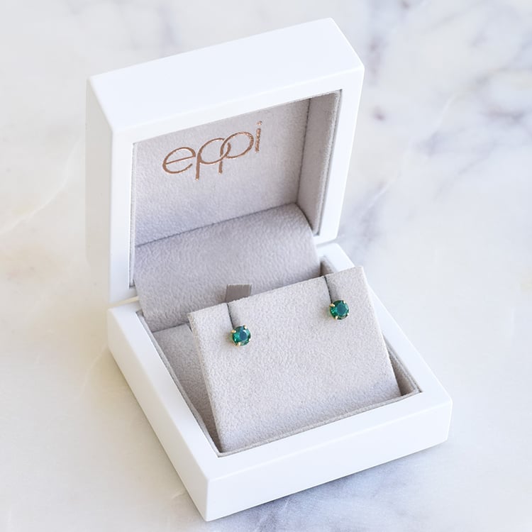 Smaragdohrringe aus Gold 86384