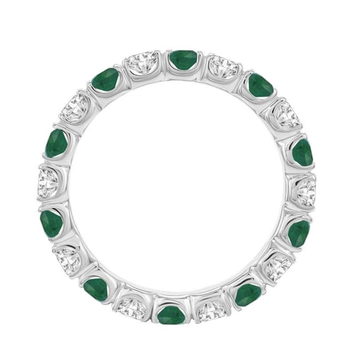 Goldener Ring rundum mit Smaragden und Diamanten Mette