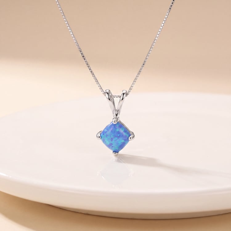 Goldener Anhänger mit blauen Topas Gea 170688