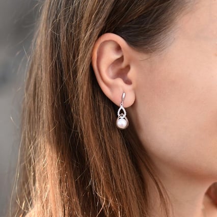 Elegante Perlohrringe aus Silber mit Zirkonia Masine