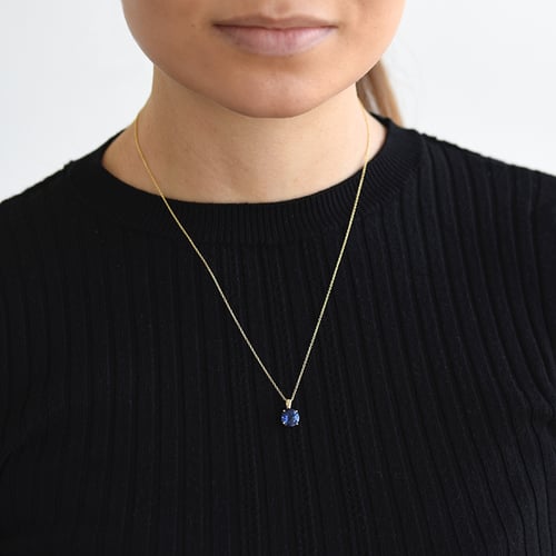 Goldener Anhänger mit blauem Saphir Icy